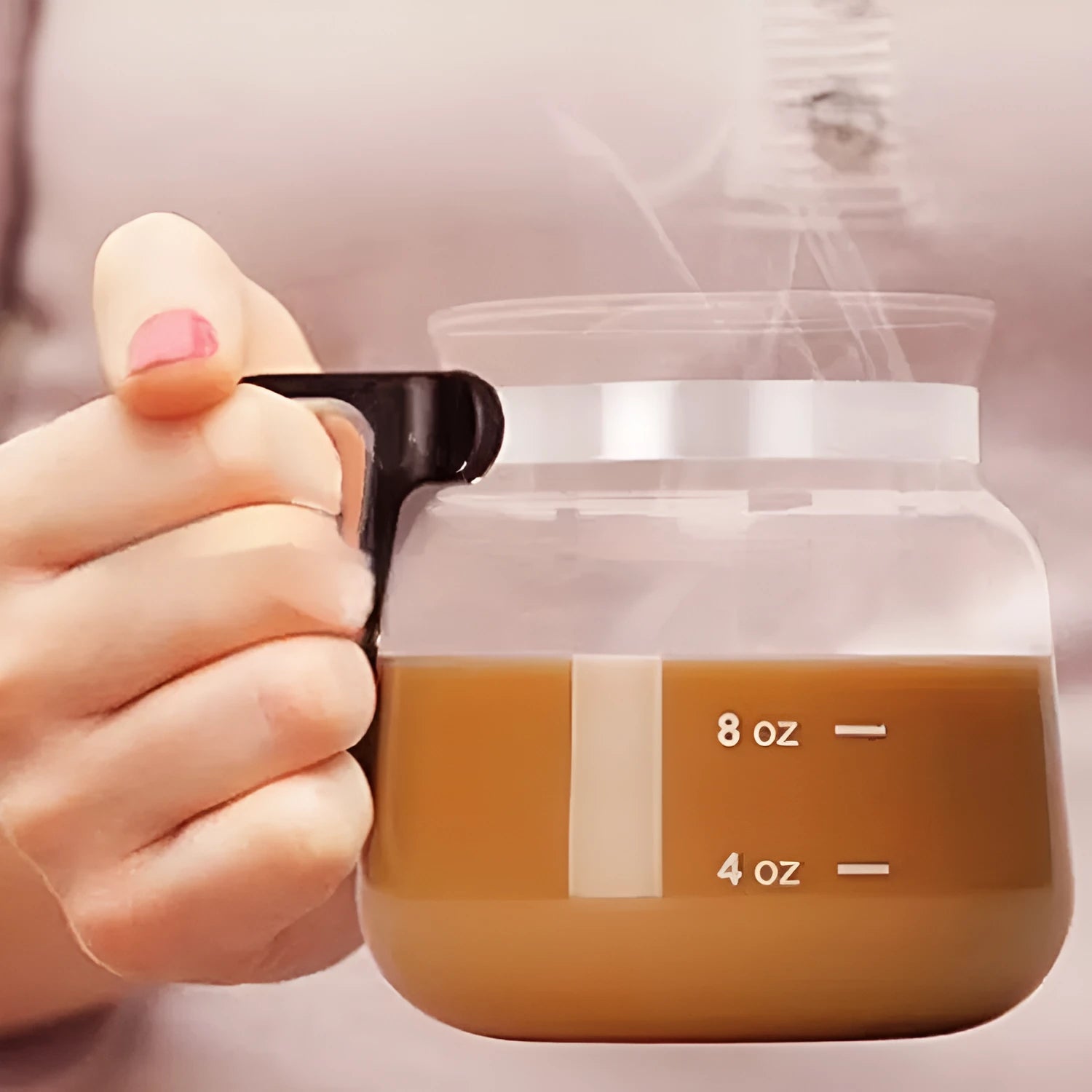 Transparent glass coffee maker with silicone cover showing pour-over design for 355ml to 473ml capacity
