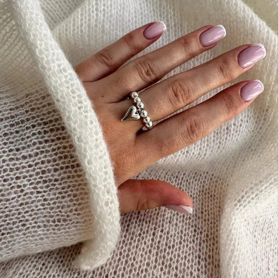 Handmade elastic beaded ring with love heart design in gold and silver electroplating