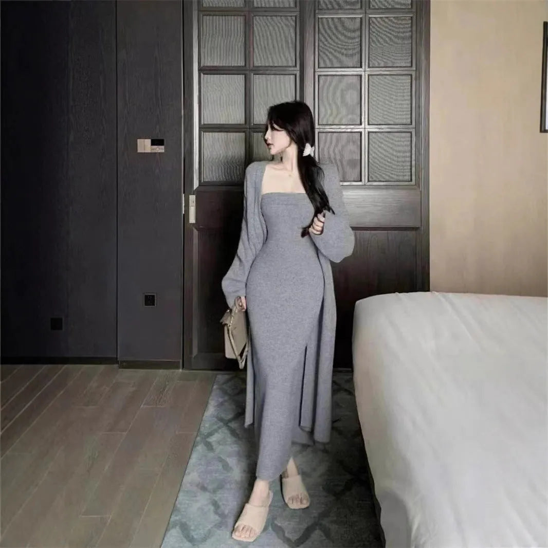 Women's grey knitted cardigan and long skirt suit set with flocking texture detail.