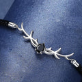 Yi Lu Has You braided rope bracelet in copper with animal zodiac design on display
