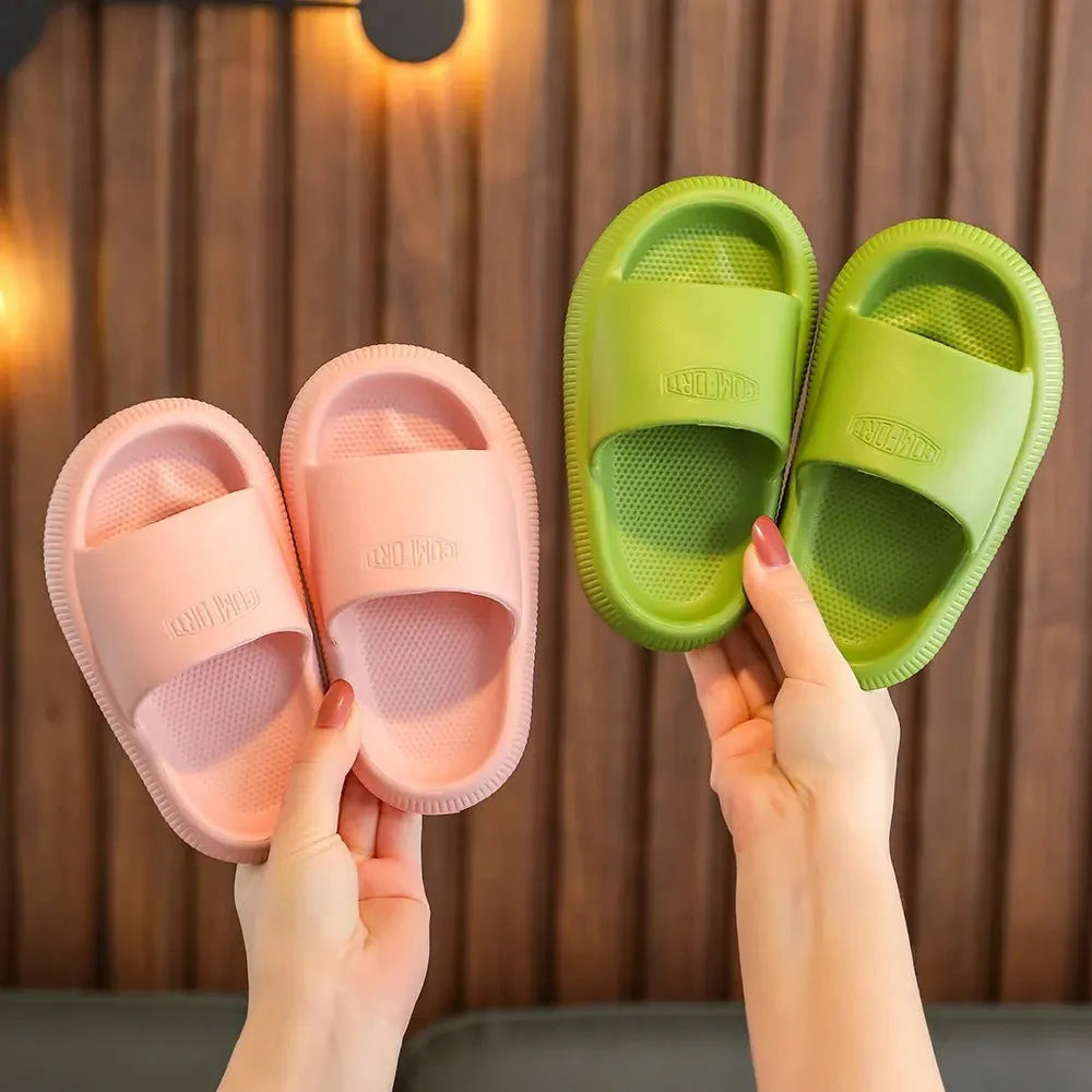 Children's mixed colour EVA slippers with a non-slip sole, shown in sizes for kids.