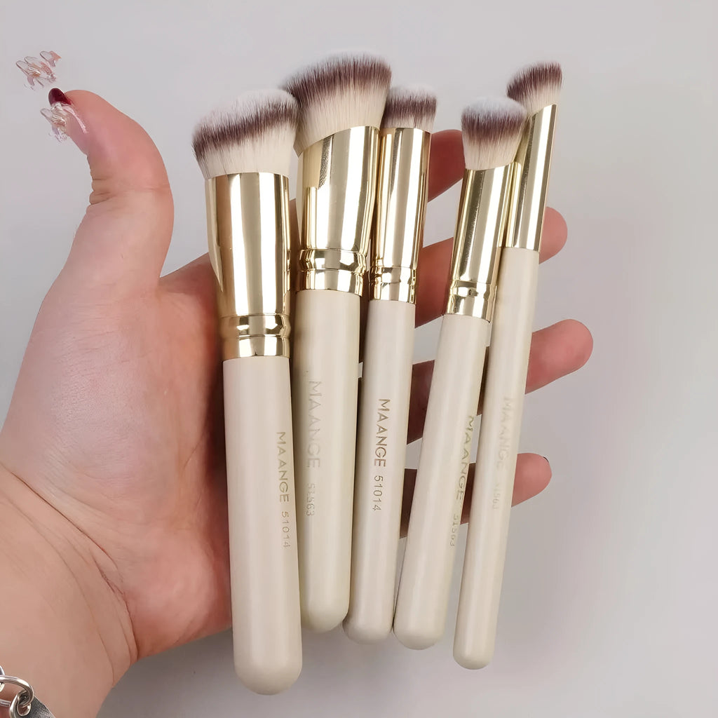 Apricot coloured MAANGE five-piece synthetic makeup brush set with angled blush brush.