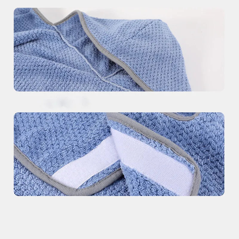 Blue microfiber dog bath robe towel with adjustable waistband wrapped around a dog