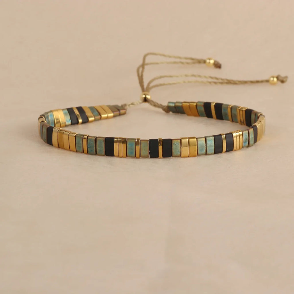Geometric glass beaded bracelet in five colour options with pull beads adjustment