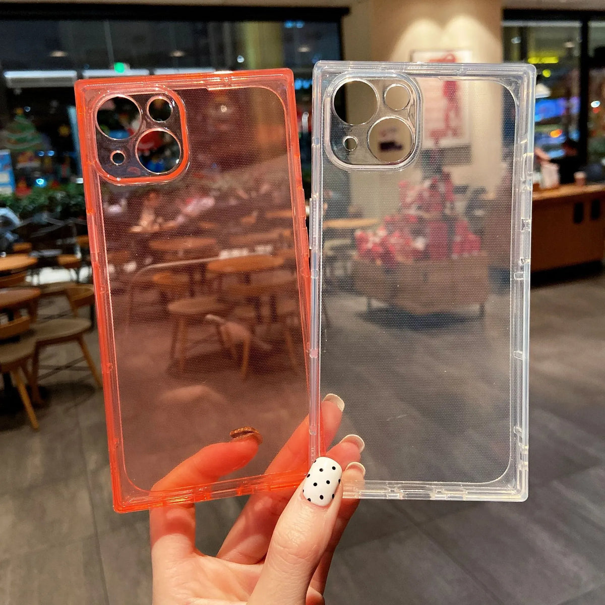 Square fluorescent TPU phone case for iPhone 13 in violet showing embossed texture and camera cutout