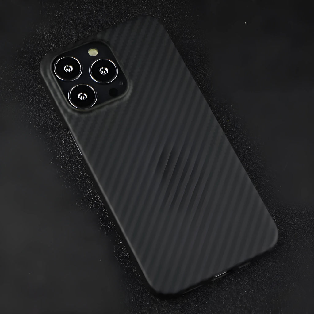Dull black kevlar fibre iPhone case with volcanic crater texture and MagSafe ring