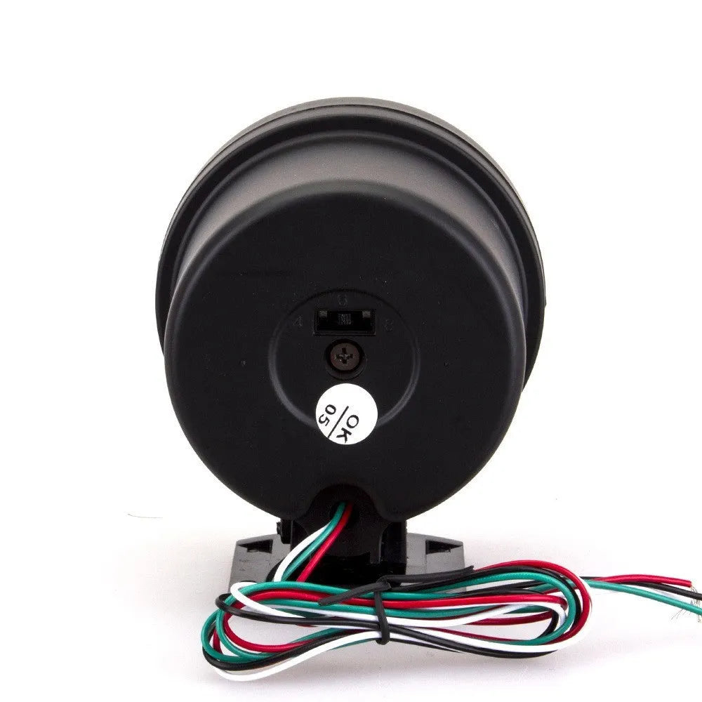 Black plastic automotive tachometer with blue light pointer display for engine speed measurement