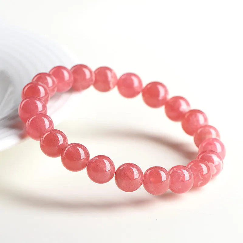 Geometric red rhodochrosite crystal bracelet for women with a Longevity Lock clasp.
