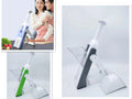 White and blue multifunctional vegetable slicer with stainless steel blades on a kitchen counter