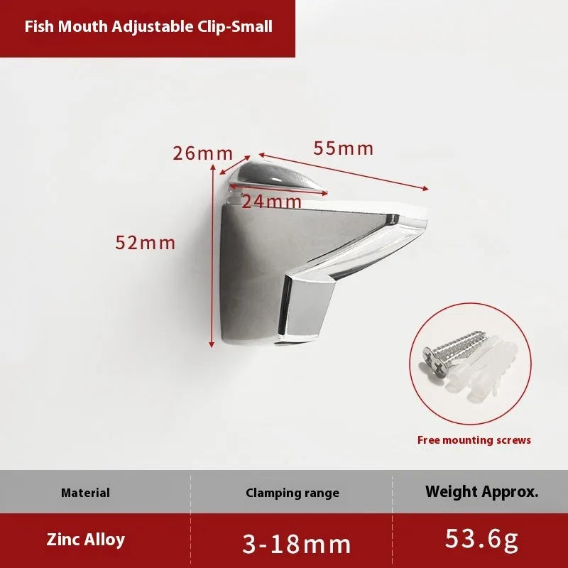 Set of silver electroplated adjustable partition clips in fish mouth and olecranon styles on a glass surface.