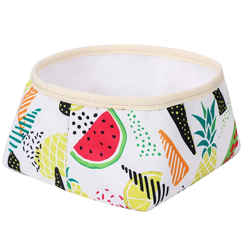 Waterproof foldable dog food bowl in purple polyester and PEVA material on a flat surface
