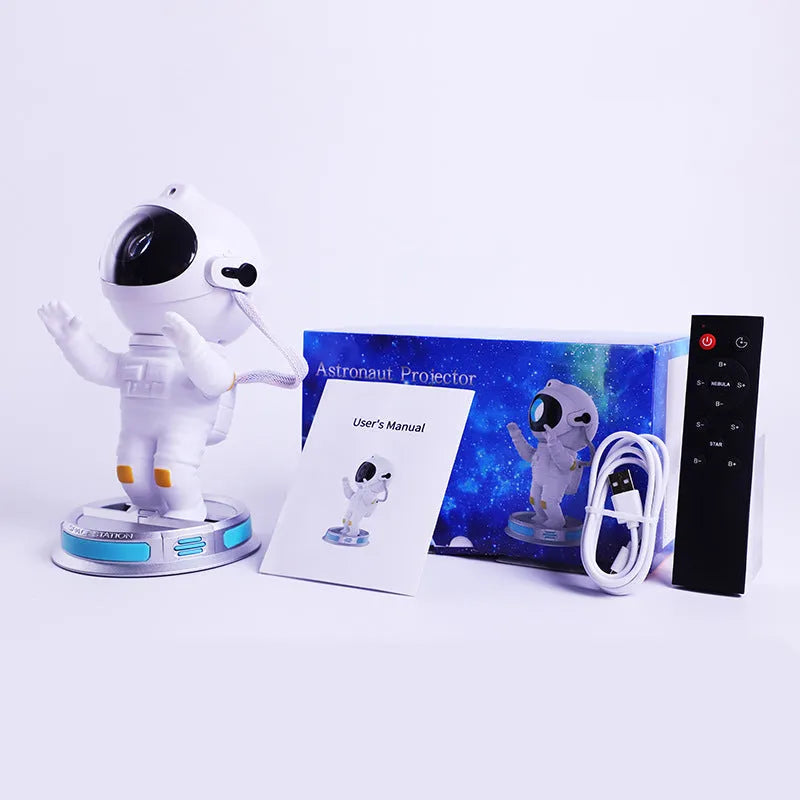 Exit Astronaut Starlight Projection Lamp 22.5cm in white on a surface projecting northern lights onto ceiling