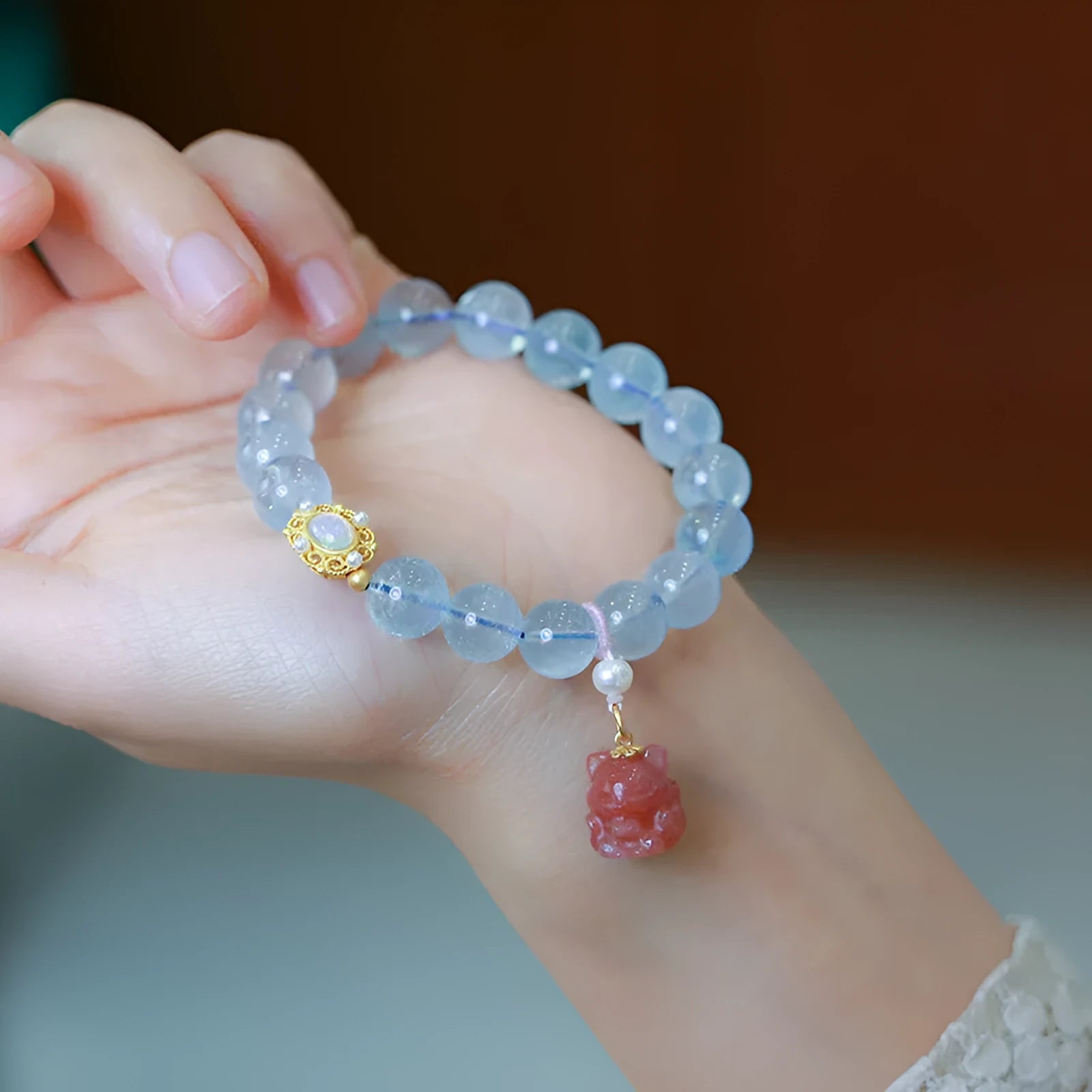 Chinese style aquamarine women's bracelet with pearl decorations and fox charm elements