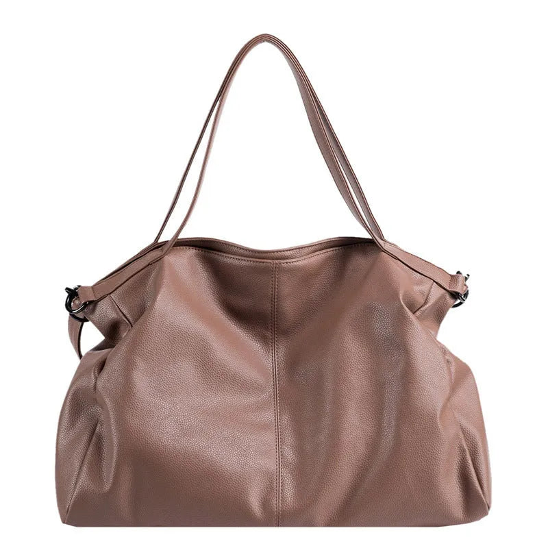 Large soft surface PU tote messenger bag in horizontal square shape with shoulder strap and zipper opening