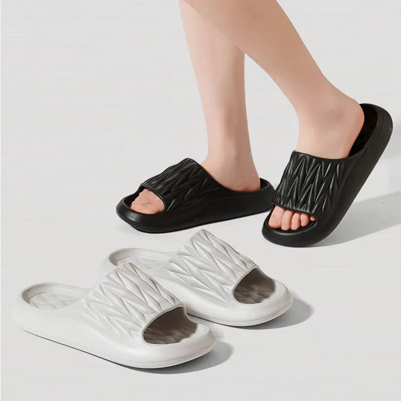 Leaf texture pattern EVA foam slippers for men and women in various colours on a white background.