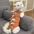 Lace-up polyester cat recovery suit in blue colour shown on a model, size L for cats 6-9kg.