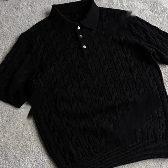 Man's grey twisted knit cotton style short sleeve T-shirt on a hanger
