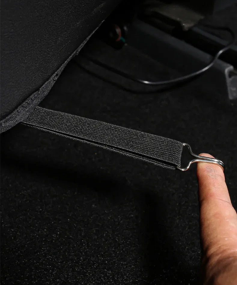 Black leather rear anti-kick pad for motorbike seat, showing single-pocket style.