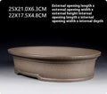 Handmade antique oval bonsai pot in purple sand clay measuring 25x21x6.3 cm