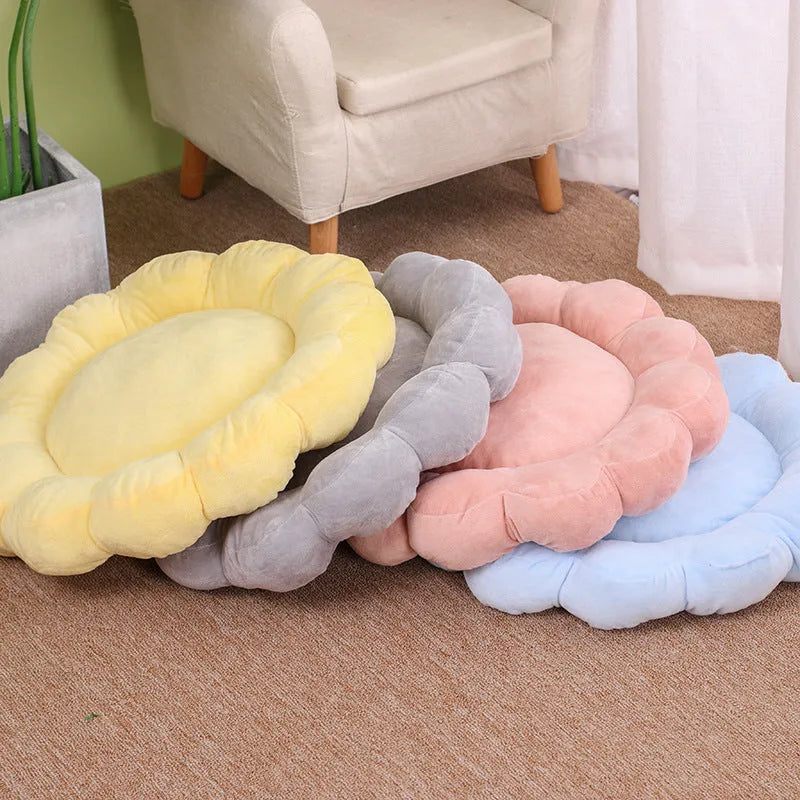 Square blue pet bed cushion with a half-surrounded side and short plush fabric