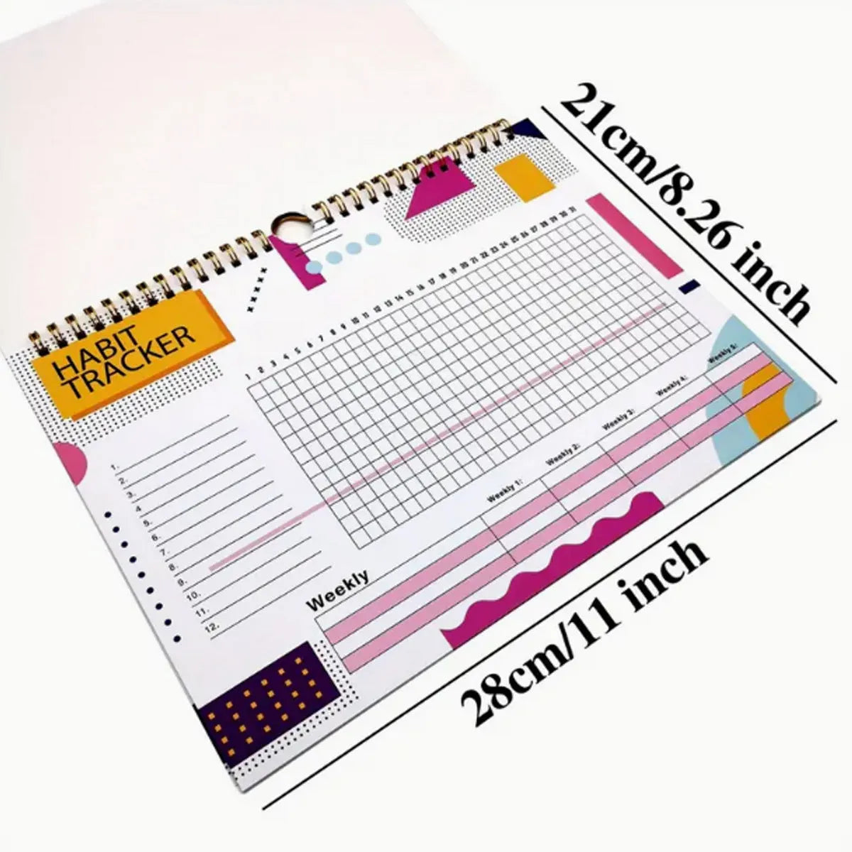 A4 habit tracking book with coloured cover open to show interior pages