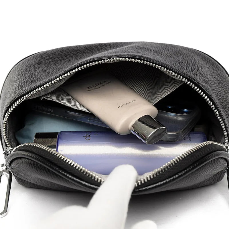 Women's soft PU messenger bag with saddle shape design and single shoulder strap in black colour