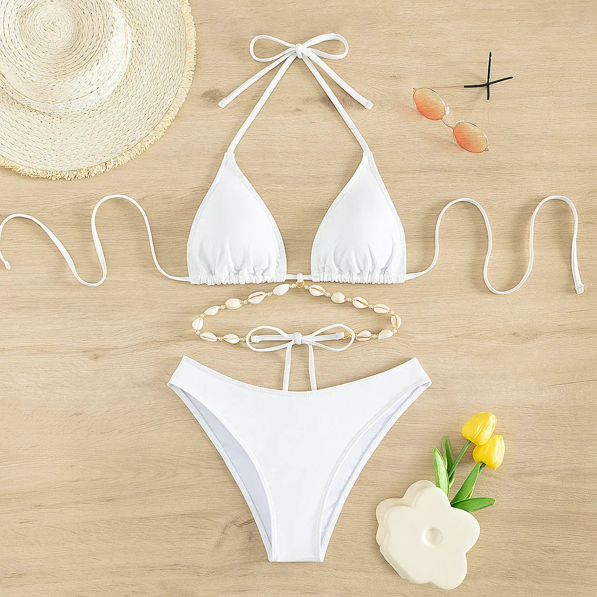 Women's white halter neck lace-up swimsuit bikini with brief-style bottom