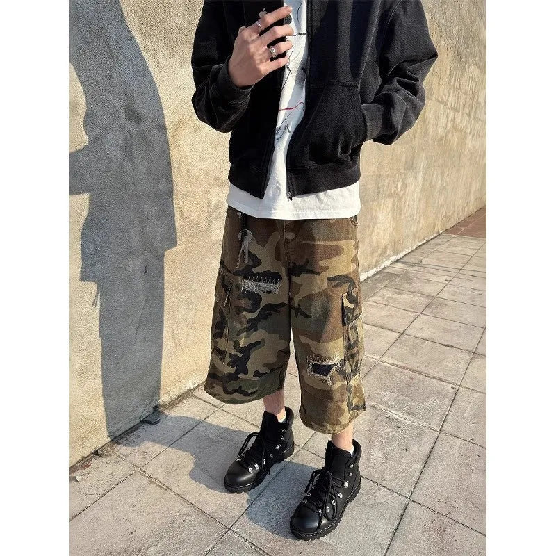 Men's loose-fit camouflage cropped jeans with ripped patches and straight leg