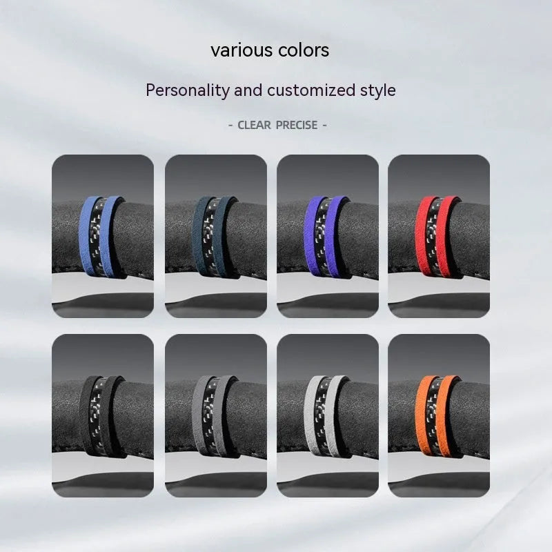 Suede and carbon fibre steering wheel cover in multiple colour options on a car steering wheel.