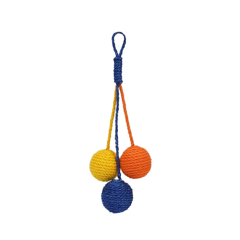 Blue, green, red, and yellow cat toy set with a teaser stick and a catnip ball.
