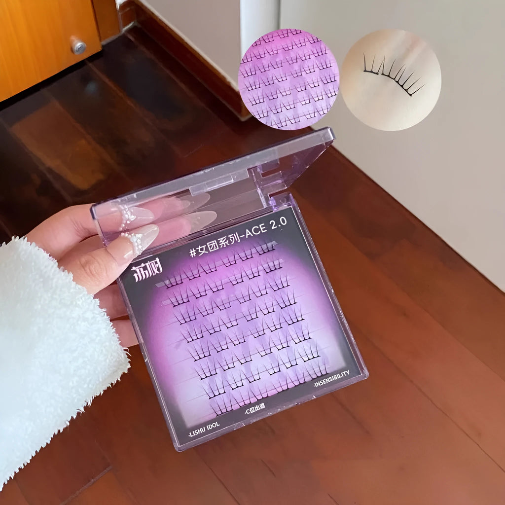Pack of reusable false eyelash clusters made from artificial fibre, shown with optional glue and tweezers.