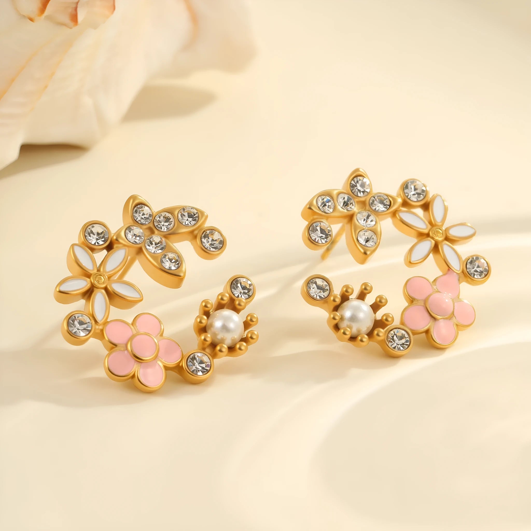 Colourful diamond flower stud earrings with gold plating and petal design