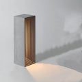 Concrete building night light table lamp in cement grey with LED illumination and Nordic style