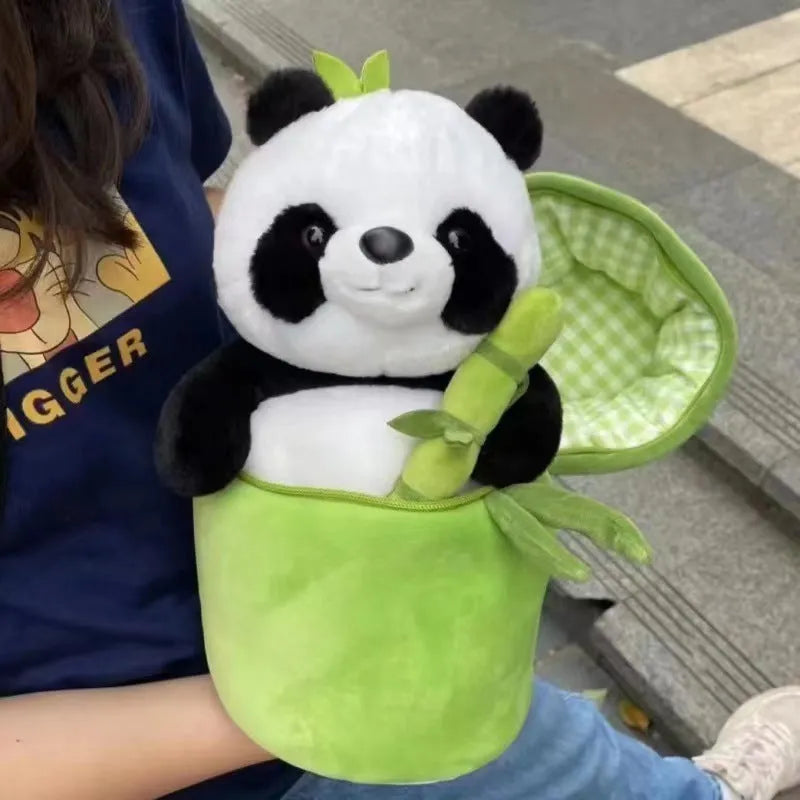 Panda plush doll holding bamboo shoots in bamboo tube design with PP cotton filling
