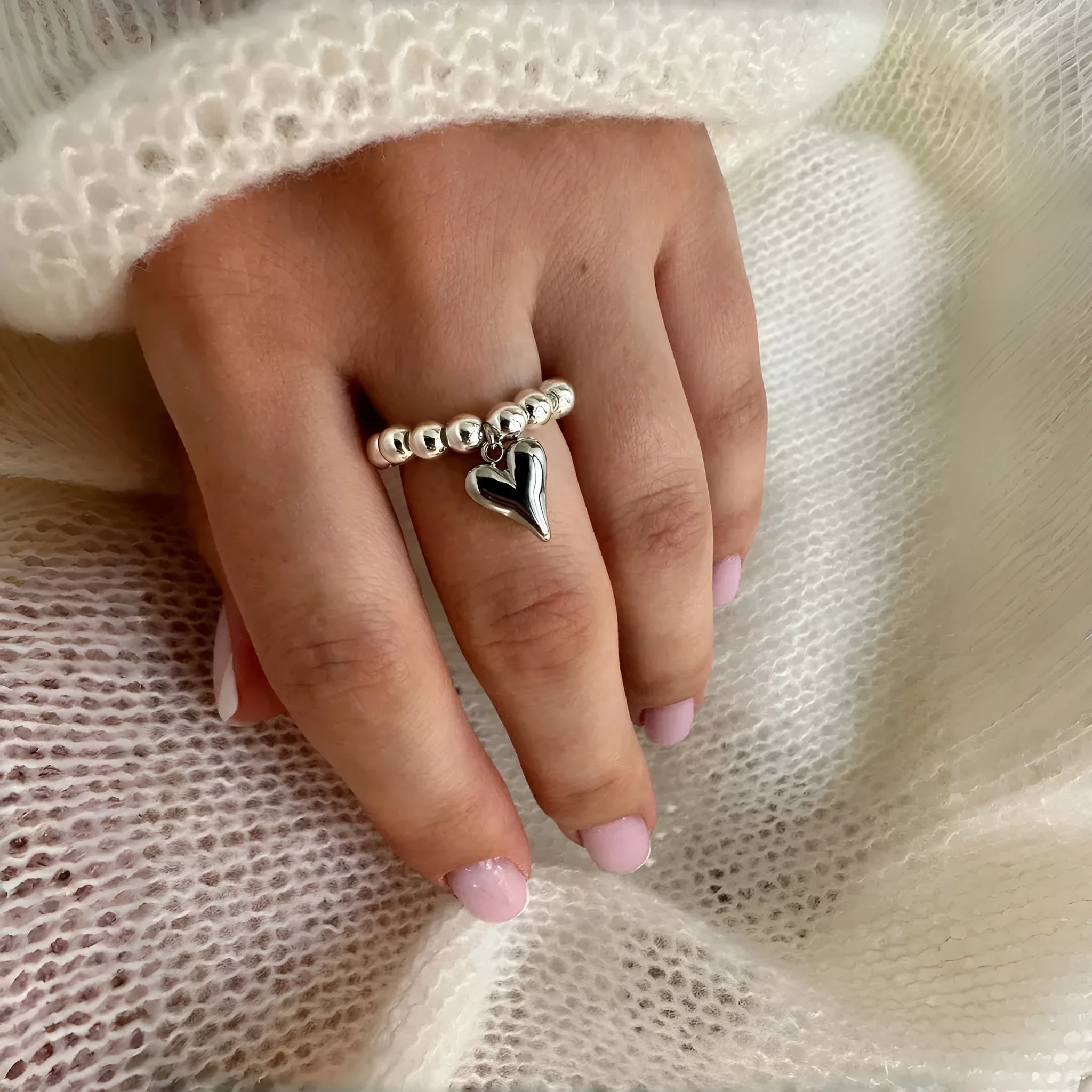 Handmade elastic beaded ring with love heart design in gold and silver electroplating