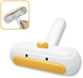 White portable pet hair remover with yellow duck cartoon design for removing fur from furniture and car seats