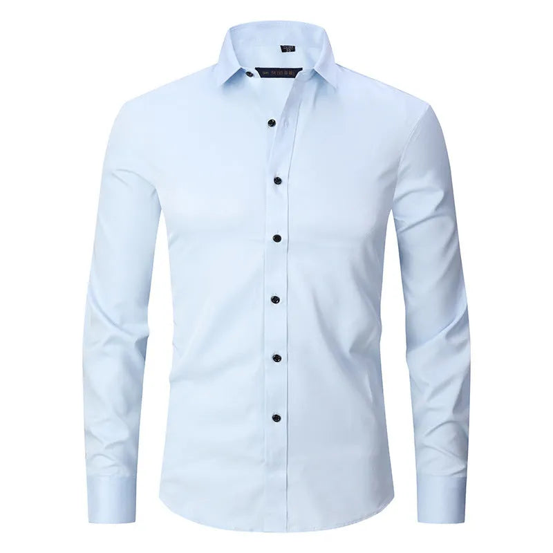 Man wearing a solid-colour stretch long sleeve work shirt made from polyester fabric.