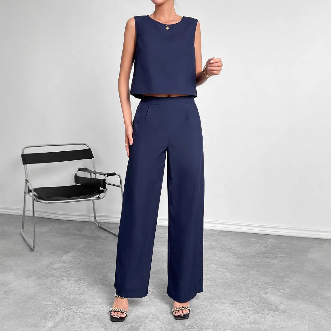 Women's red polyester two-piece set with sleeveless round neck top and wide leg trousers