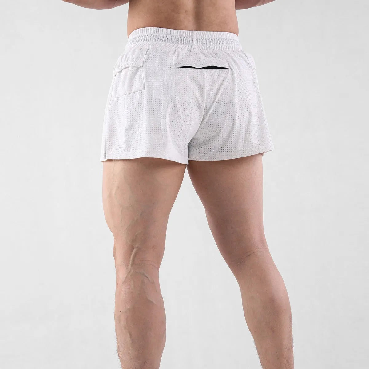 Men's black and white quick-drying nylon shorts for summer sports and leisure.