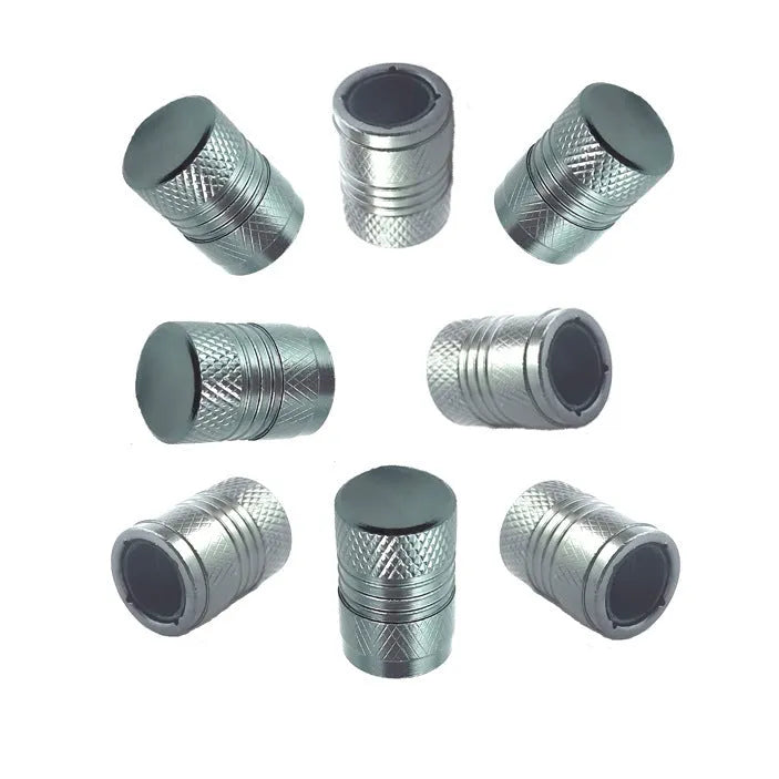 Aluminium car tyre valve dust cap in black, blue, grey, and red colours.
