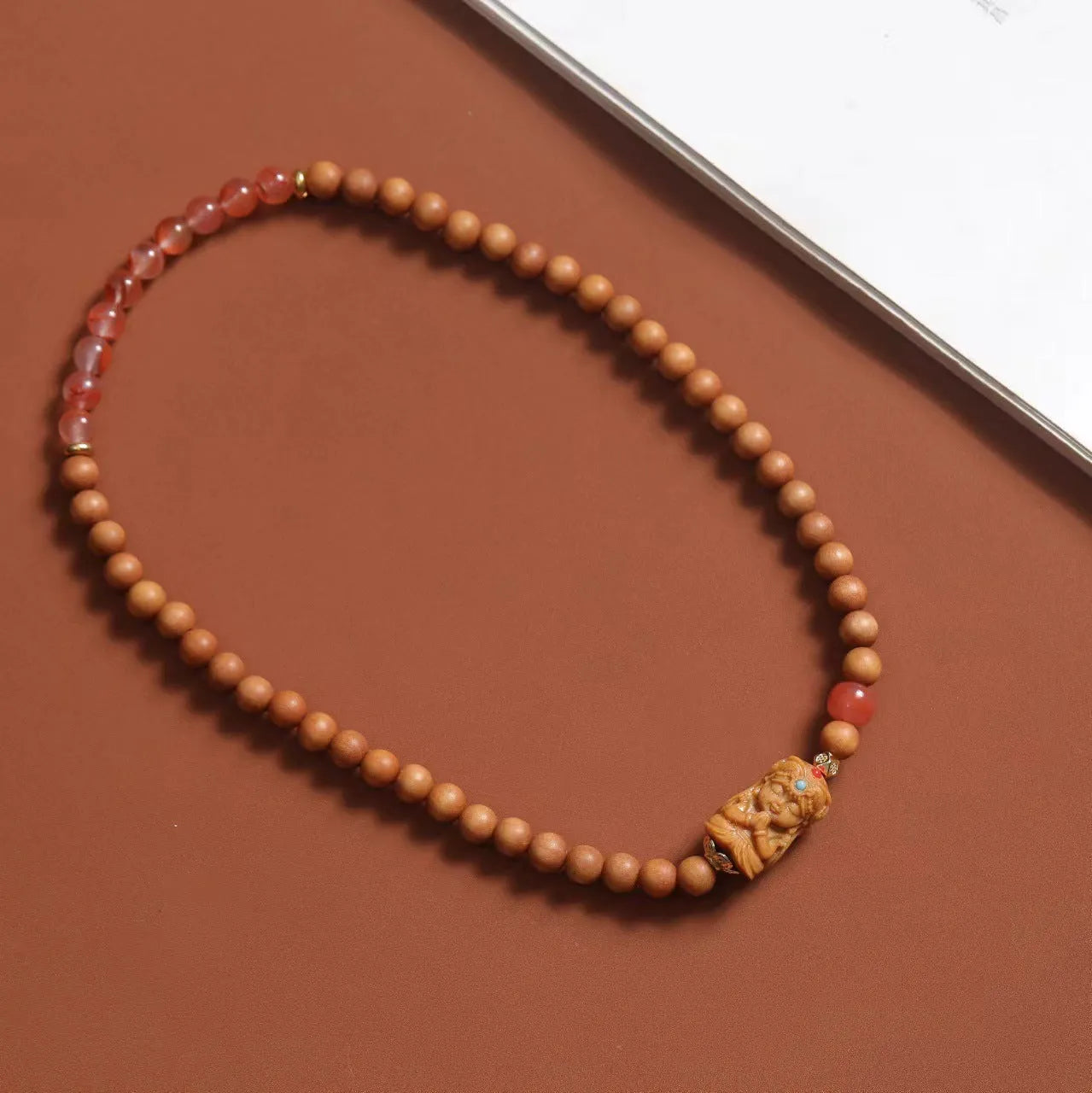 Brown sandalwood bracelet with South Red double circle design and 6mm round beads