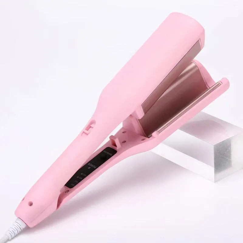 32mm pink hair curling iron with ceramic barrel and 4 heat settings on white background