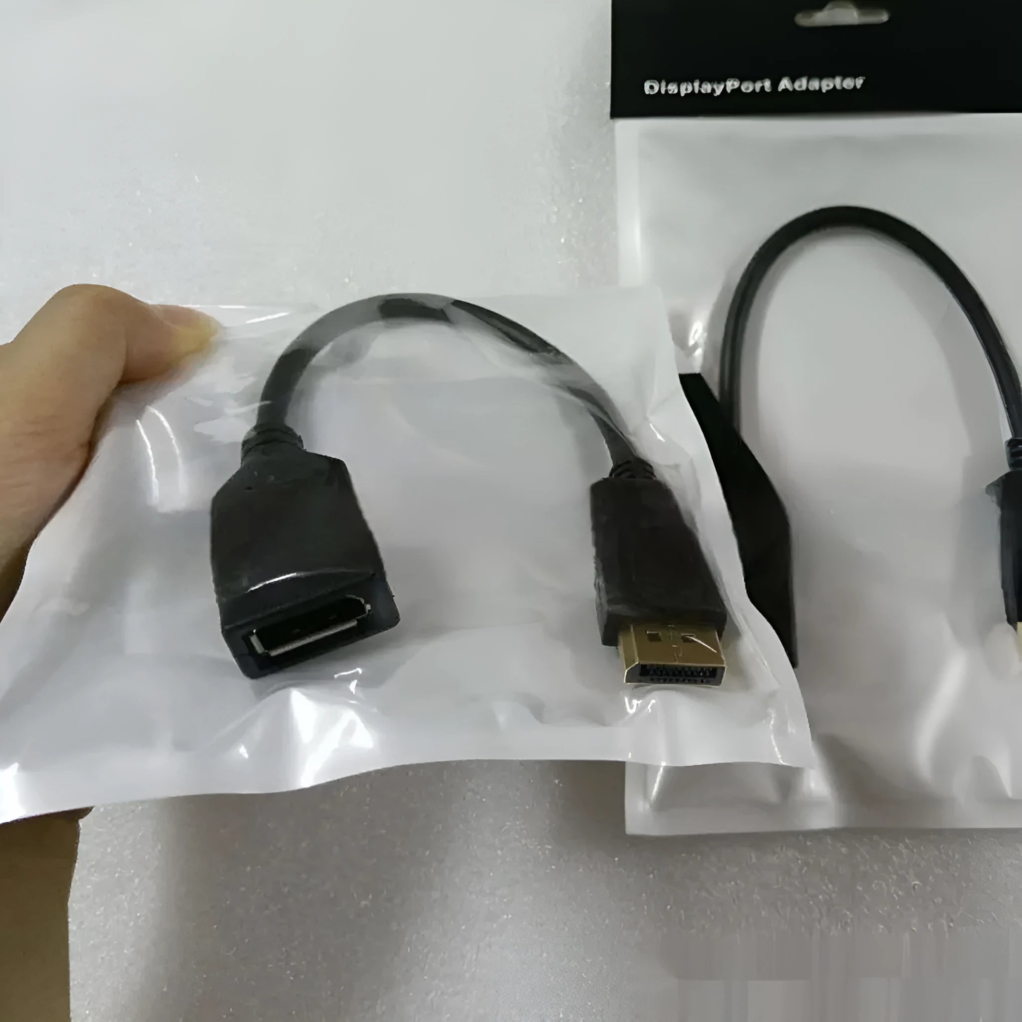 Black DisplayPort DP male to female extension cable approximately 10cm length with rotating connector