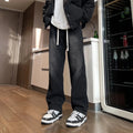 Men's straight-leg denim trousers in loose fit with drawstring waist closure