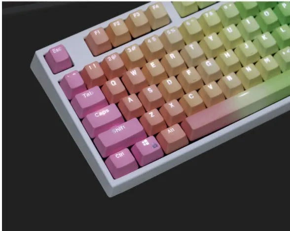 104 key set of PBT word penetration dyed keycaps in rainbow gradient style with translucent legends