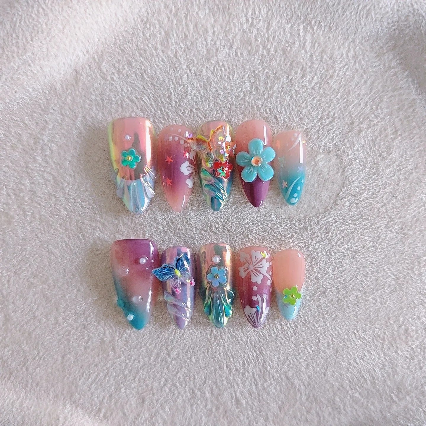 Handmade colourful embossed floral and butterfly nail art sculptures in sizes XS, S, M, L.