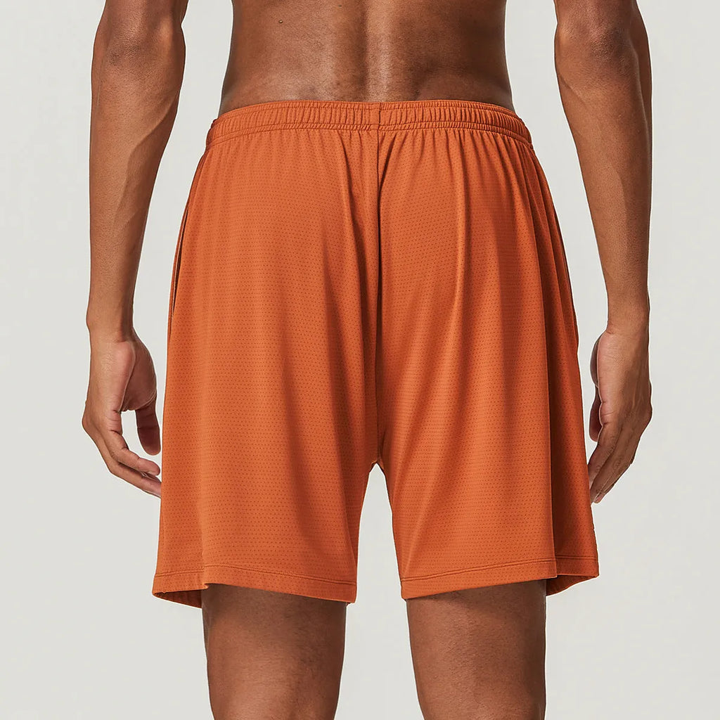 Men's quick-dry running shorts in sky green, showing double-layer construction and mid-waist short length.