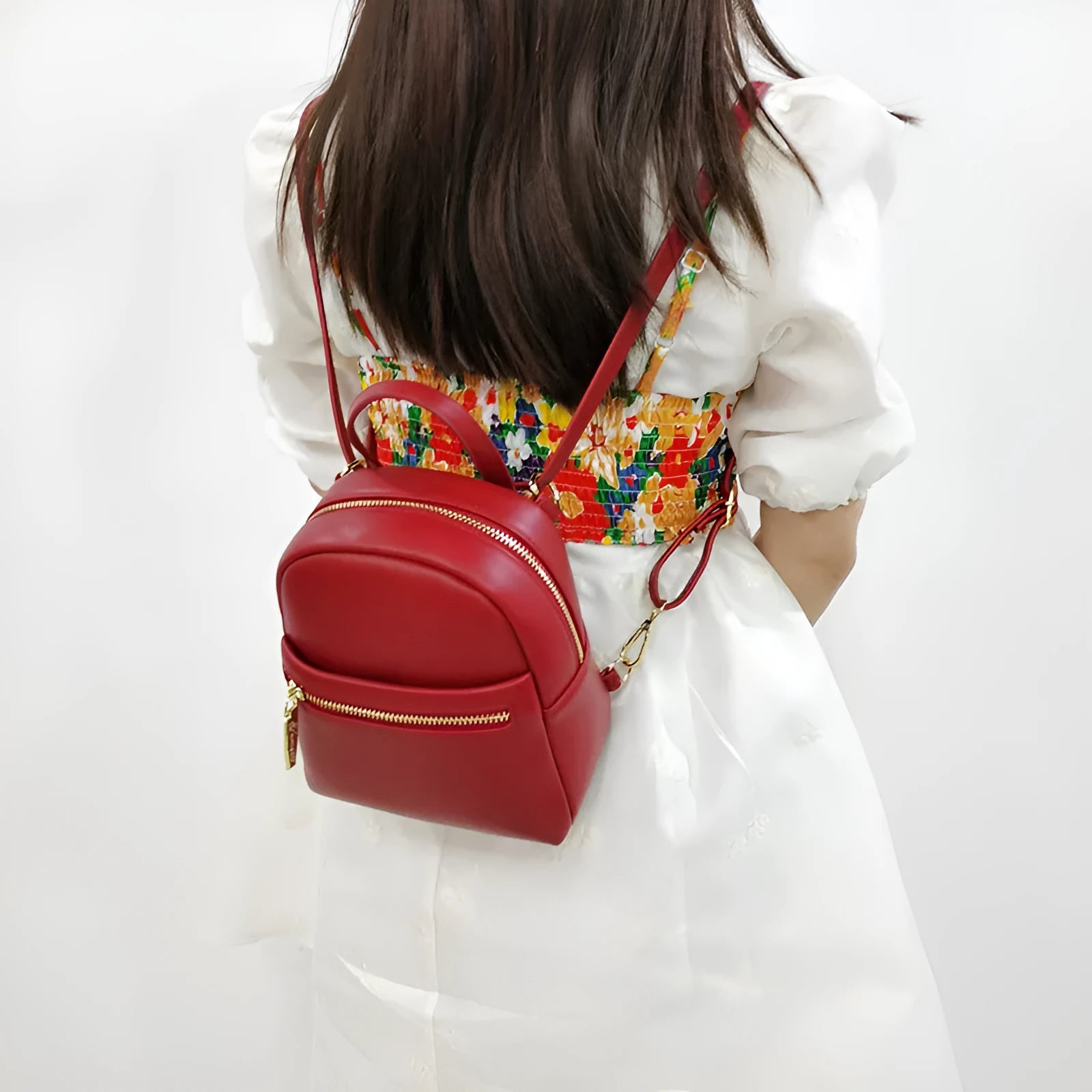 Soft PU mini backpack in street fashion design with contrast colour detailing and interior compartments