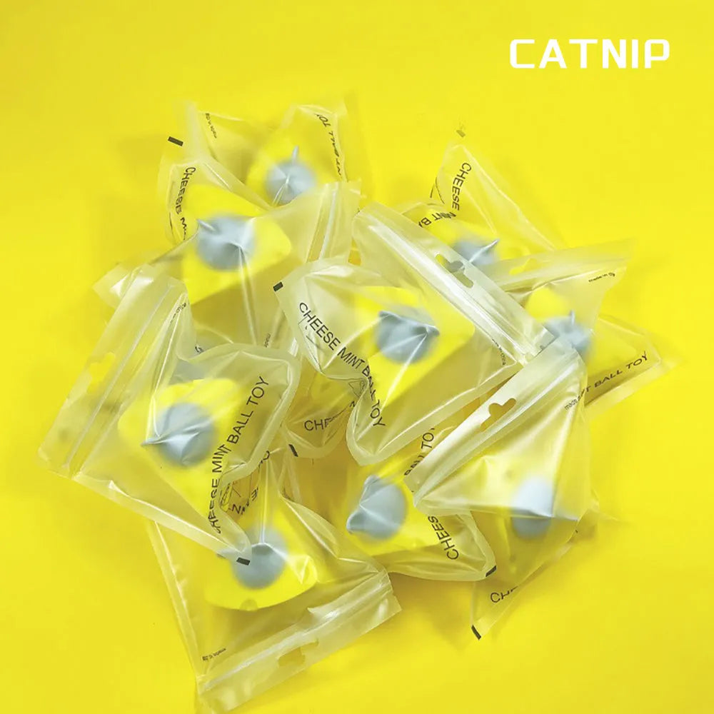 Yellow catnip and silvervine chew balls for cat teeth cleaning and play