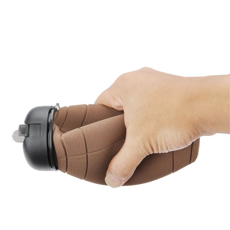 Brown rugby ball-shaped collapsible sports water bottle, 600ml, food-grade silicone, leak-proof seal, non-slip grip.